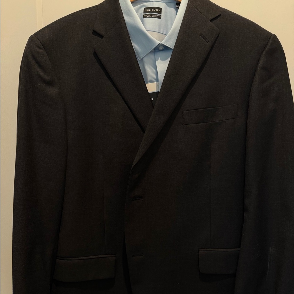 Black suit by Hart Schnaffer Marx.